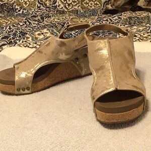Tan shiny wedge sandals. Worn twice. Size 8 very nice